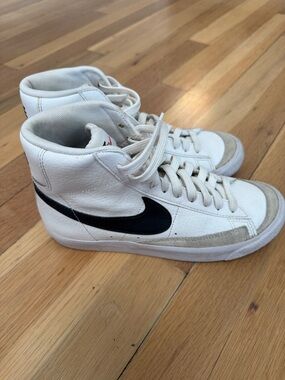 Nike High-Top Sneakers in White with Black Swoosh